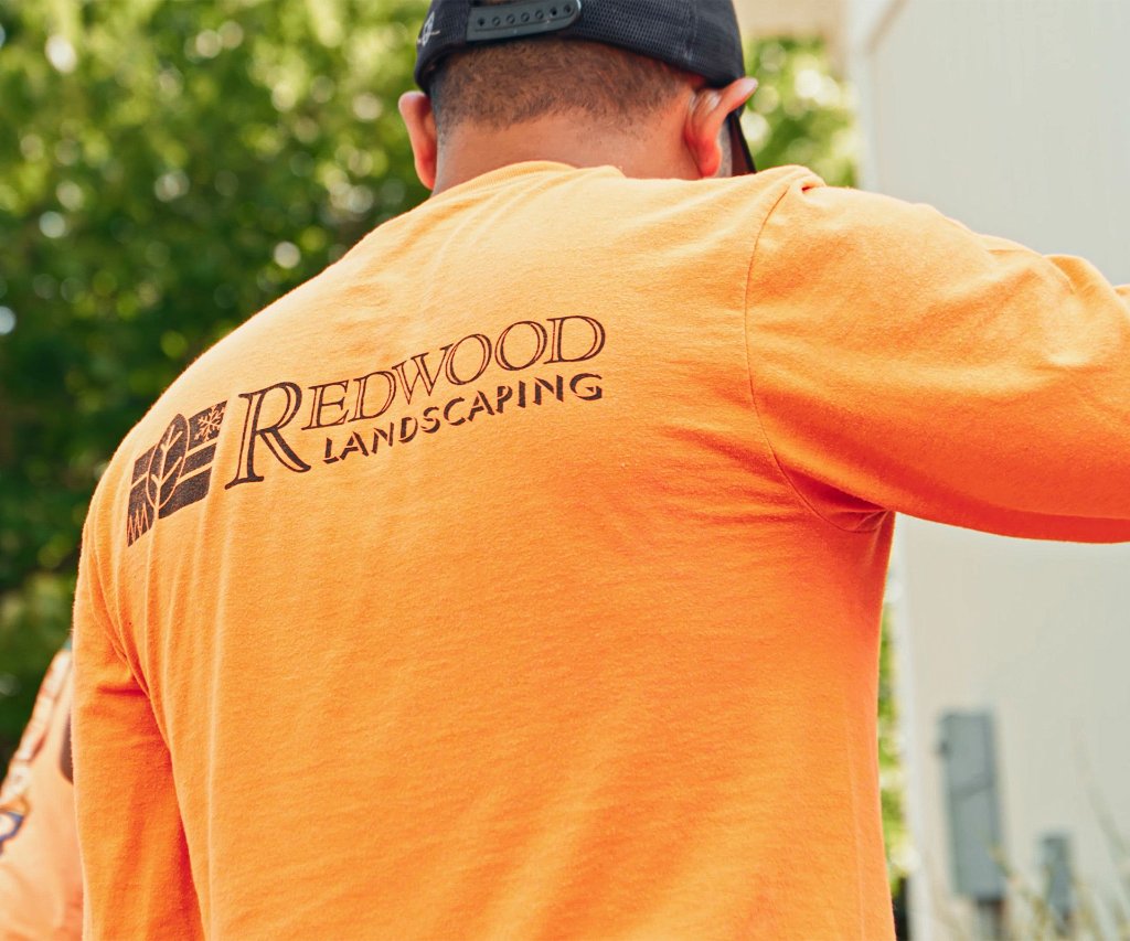 Redwood Landscaping crew member on the job